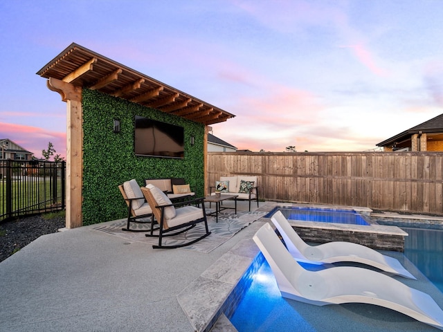 9715 Migrant Hawker Ct, Conroe, TX 77385 - view of pool featuring a fenced backyard, a patio, a jacuzzi, and an outdoor hangout area