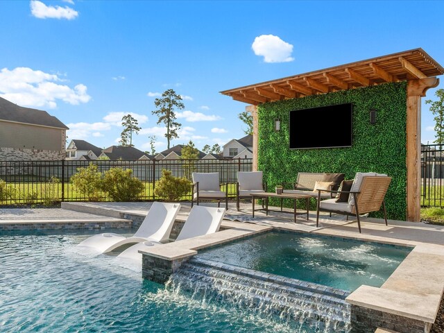 9715 Migrant Hawker Ct, Conroe, TX 77385 - view of swimming pool with a patio and a pool with connected hot tub