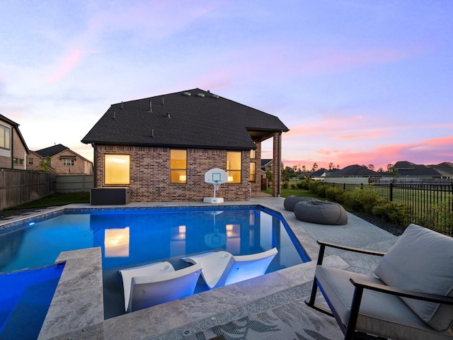 9715 Migrant Hawker Ct, Conroe, TX 77385 - view of swimming pool featuring an in-ground hot tub, a fenced backyard, and a patio area