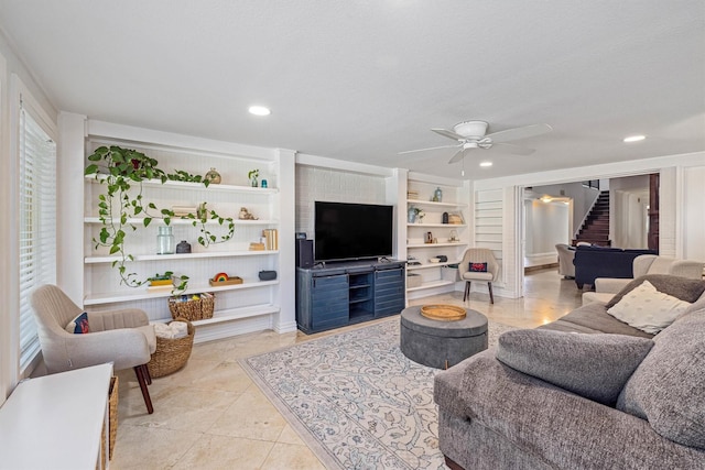 36 Lakeview Dr, Galveston, TX 77551 - living room with stairway, ceiling fan, built in shelves, and recessed lighting