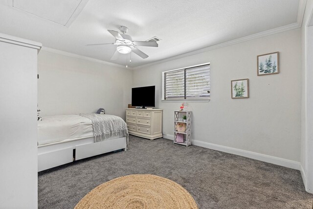 36 Lakeview Dr, Galveston, TX 77551 - carpeted bedroom with ornamental molding, attic access, ceiling fan, and baseboards