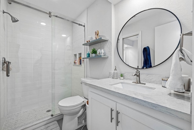 36 Lakeview Dr, Galveston, TX 77551 - full bathroom with a stall shower, vanity, and toilet