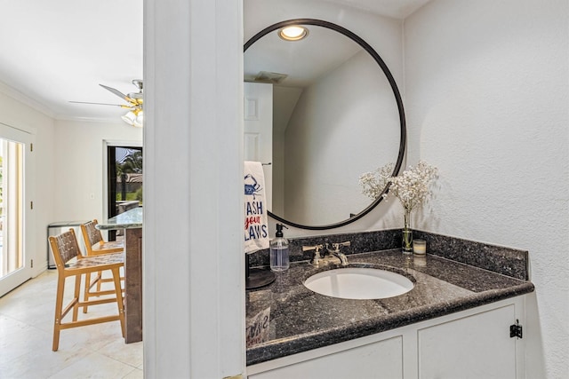 36 Lakeview Dr, Galveston, TX 77551 - bathroom with vanity, a ceiling fan, ornamental molding, and tile patterned floors