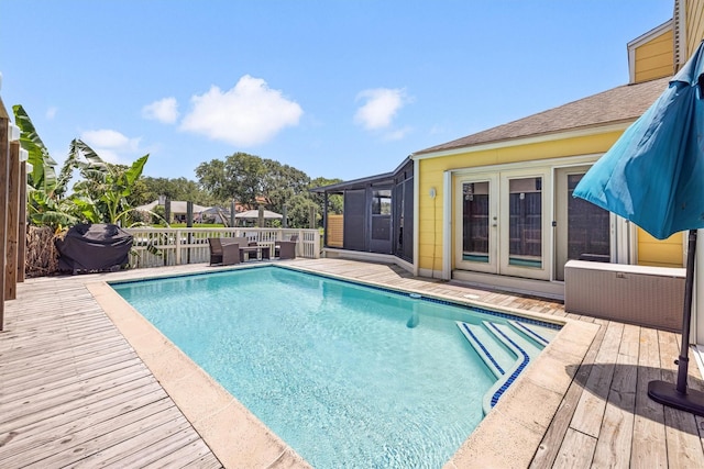 36 Lakeview Dr, Galveston, TX 77551 - view of pool featuring a deck, french doors, and area for grilling