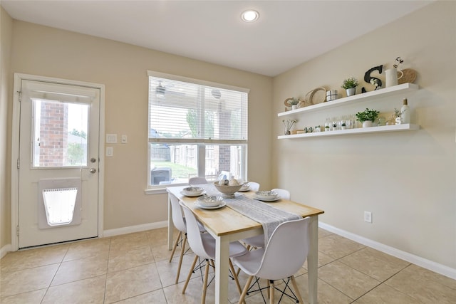 19538 Salt Grass Meadow Dr, Cypress, TX 77433 - dining space with light tile patterned floors, baseboards, and recessed lighting