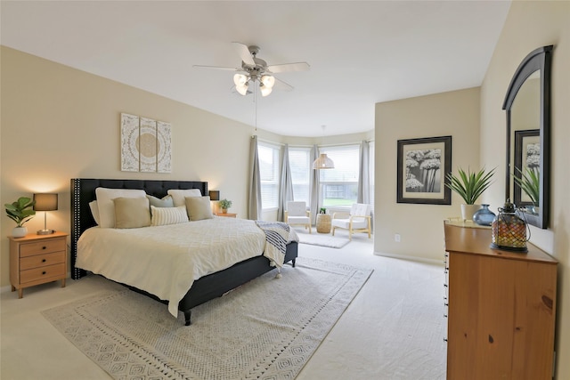 19538 Salt Grass Meadow Dr, Cypress, TX 77433 - bedroom featuring light carpet, baseboards, and a ceiling fan