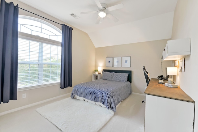 19538 Salt Grass Meadow Dr, Cypress, TX 77433 - carpeted bedroom with baseboards, vaulted ceiling, multiple windows, and a ceiling fan