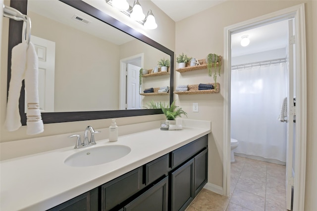 19538 Salt Grass Meadow Dr, Cypress, TX 77433 - full bath with vanity, toilet, tile patterned flooring, and curtained shower