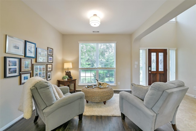 19538 Salt Grass Meadow Dr, Cypress, TX 77433 - living room featuring baseboards and dark wood-style flooring