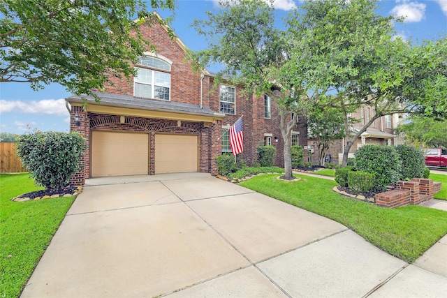 19538 Salt Grass Meadow Dr, Cypress, TX 77433 - traditional-style house with brick siding, an attached garage, a front yard, and driveway