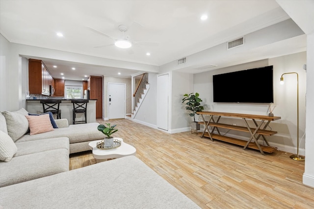 811 Lovett Blvd Unit 26, Houston, TX 77006 - living room with ceiling fan, stairway, light wood-style floors, and recessed lighting