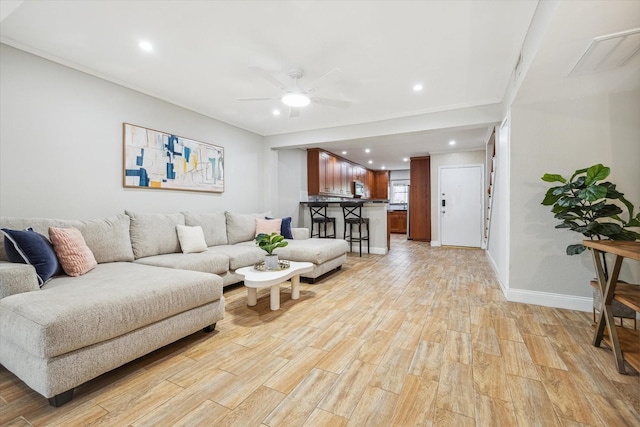 811 Lovett Blvd Unit 26, Houston, TX 77006 - living room featuring light wood finished floors, a ceiling fan, and recessed lighting