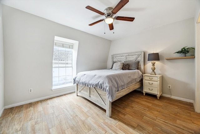 811 Lovett Blvd Unit 26, Houston, TX 77006 - bedroom featuring light wood-style flooring and ceiling fan