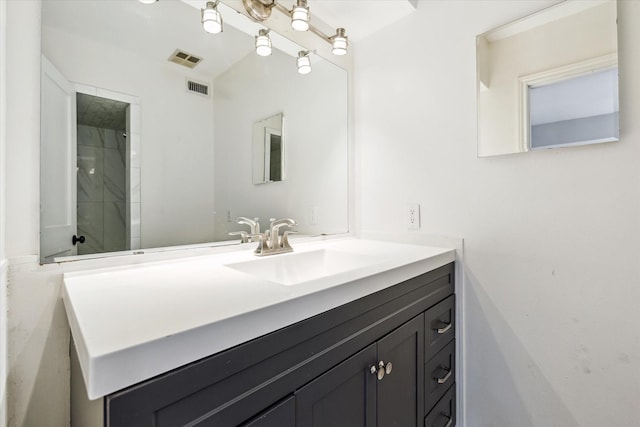 811 Lovett Blvd Unit 26, Houston, TX 77006 - bathroom with vanity and a shower