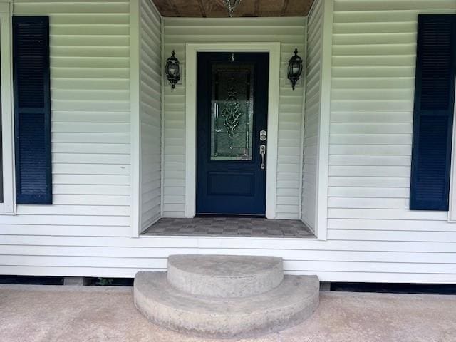 8594 Morgan Ln, Orange, TX 77632 - view of exterior entry featuring covered porch