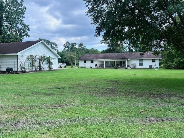 8594 Morgan Ln, Orange, TX 77632 - view of green lawn