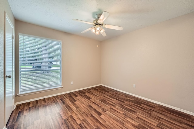 9519 Landry Blvd, Spring, TX 77379 - empty room featuring wood finished floors, baseboards, ceiling fan, and a textured ceiling