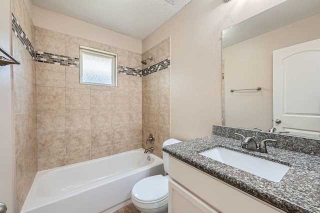9519 Landry Blvd, Spring, TX 77379 - full bathroom with toilet, vanity, washtub / shower combination, and a textured ceiling