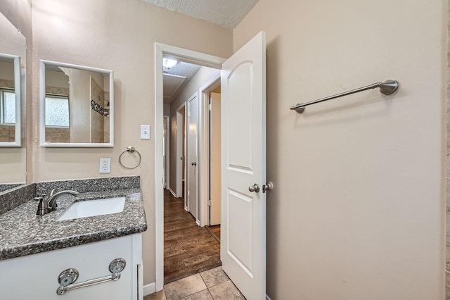 9519 Landry Blvd, Spring, TX 77379 - bathroom with vanity and tile patterned flooring