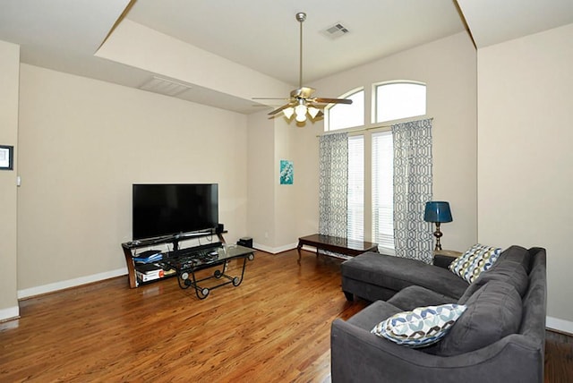 2366 Bastrop St, Houston, TX 77004 - living room featuring baseboards, wood finished floors, and ceiling fan