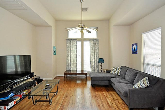 2366 Bastrop St, Houston, TX 77004 - living room featuring ceiling fan, wood finished floors, and baseboards