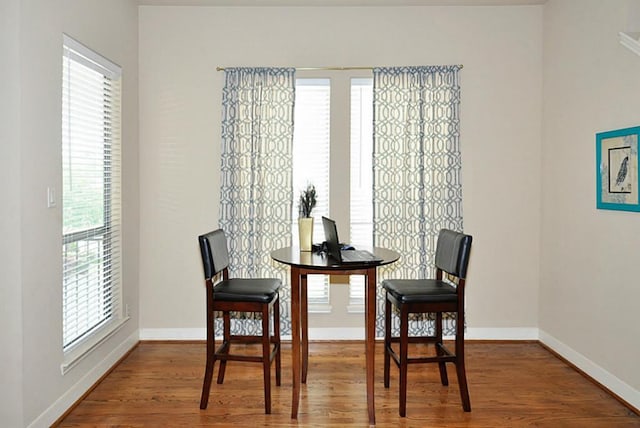 2366 Bastrop St, Houston, TX 77004 - dining area featuring healthy amount of natural light, wood finished floors, and baseboards