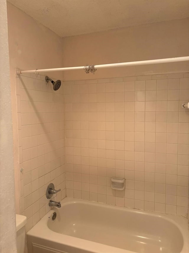 10049 Westpark Dr Unit 120, Houston, TX 77042 - full bath featuring toilet and shower / tub combination