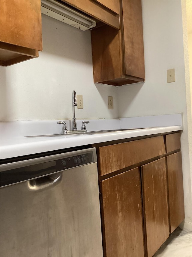 10049 Westpark Dr Unit 120, Houston, TX 77042 - kitchen featuring dishwasher and light countertops