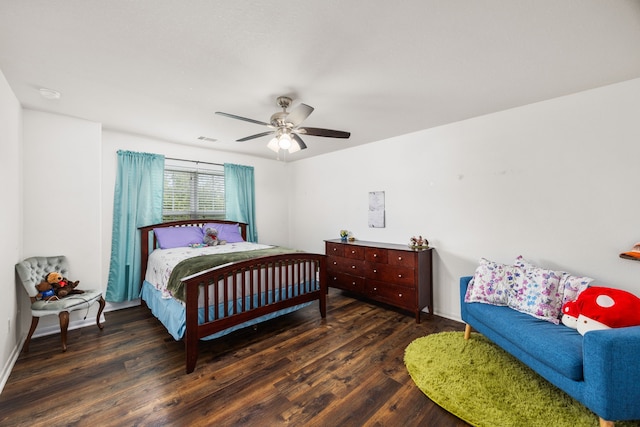 6215 Oxford Lake Dr, Rosenberg, TX 77471 - bedroom featuring wood finished floors, a ceiling fan, and baseboards
