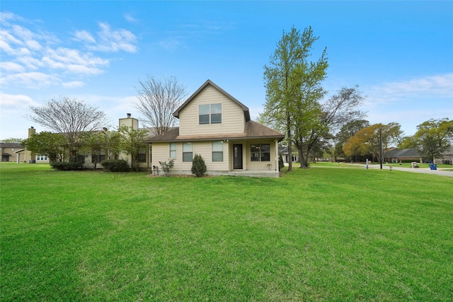 14876 Cetus Ct, Willis, TX 77318 - view of front of home featuring a front lawn