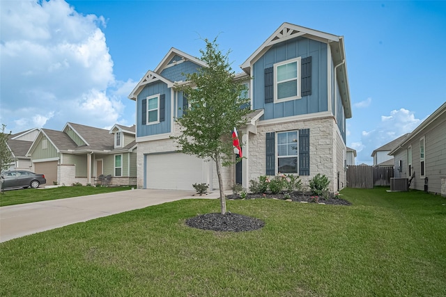 23834 Thistle Spud Ln, Hockley, TX 77447 - craftsman-style house featuring board and batten siding, stone siding, an attached garage, driveway, and central air condition unit