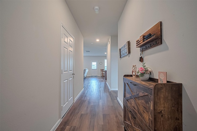 23834 Thistle Spud Ln, Hockley, TX 77447 - hallway featuring dark wood-style floors, baseboards, and recessed lighting