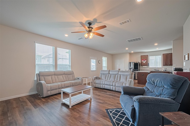 23834 Thistle Spud Ln, Hockley, TX 77447 - living area featuring ceiling fan, dark wood-style floors, recessed lighting, and baseboards