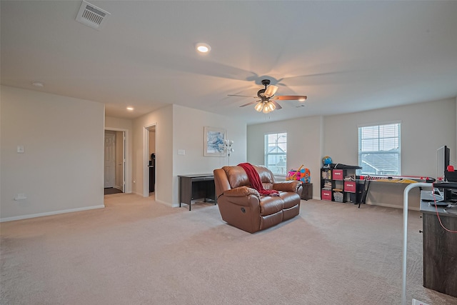 23834 Thistle Spud Ln, Hockley, TX 77447 - living area featuring light carpet, ceiling fan, baseboards, and recessed lighting