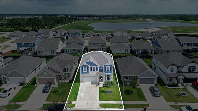 23834 Thistle Spud Ln, Hockley, TX 77447 - aerial perspective of suburban area with property boundaries highlighted and a large body of water