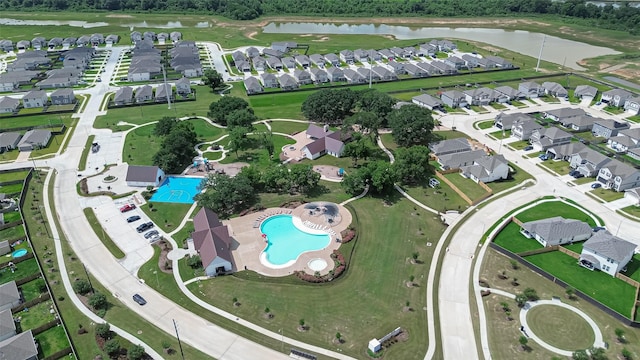 23834 Thistle Spud Ln, Hockley, TX 77447 - view of property location featuring a nearby body of water, a pool, and nearby suburban area
