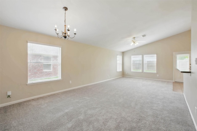 18330 Melissa Springs Dr, Tomball, TX 77375 - empty room with a chandelier, ceiling fan, vaulted ceiling, light carpet, and baseboards