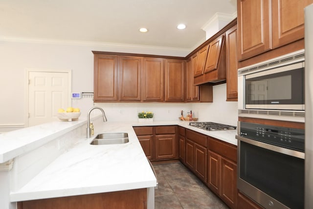 4256 Childress St, Houston, TX 77005 - kitchen featuring appliances with stainless steel finishes, a sink, crown molding, a peninsula, and recessed lighting
