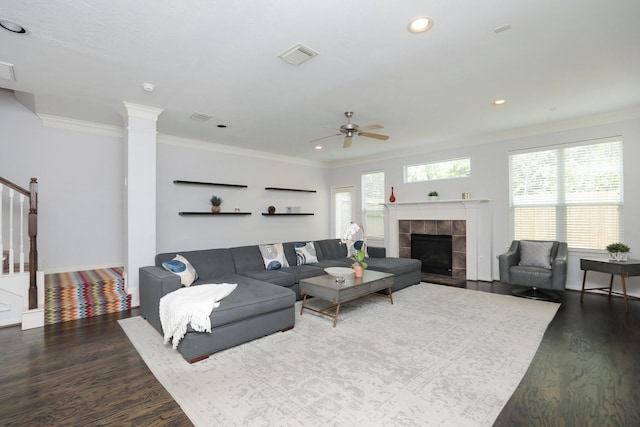4256 Childress St, Houston, TX 77005 - living area featuring wood finished floors, a fireplace, crown molding, ceiling fan, and recessed lighting