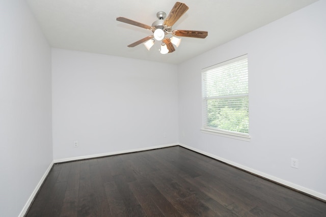 4256 Childress St, Houston, TX 77005 - empty room featuring dark wood-style floors, a ceiling fan, and baseboards