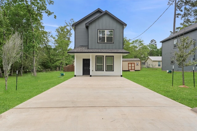 705 Little River Dr, Montgomery, TX 77316 - traditional home with board and batten siding, driveway, a front lawn, and a porch
