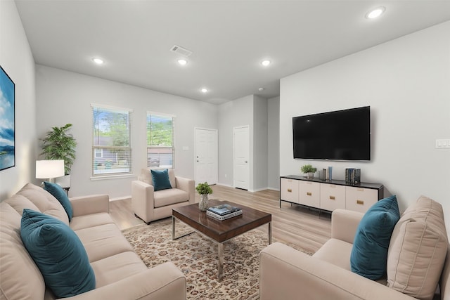 705 Little River Dr, Montgomery, TX 77316 - living room featuring light wood finished floors, baseboards, and recessed lighting
