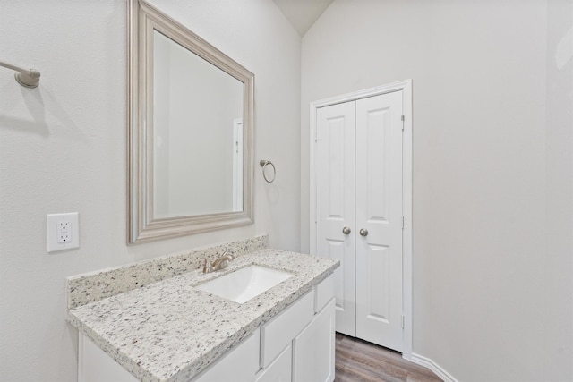 705 Little River Dr, Montgomery, TX 77316 - bathroom with vanity and wood finished floors