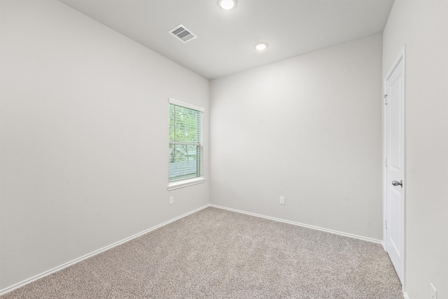 705 Little River Dr, Montgomery, TX 77316 - spare room featuring carpet flooring, recessed lighting, and baseboards