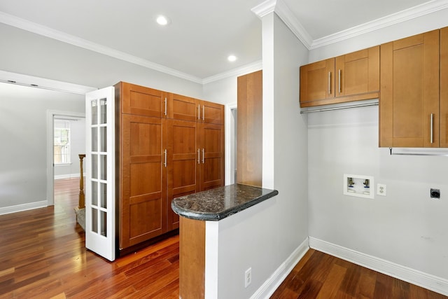 263 S Crimson Clover Ct, The Woodlands, TX 77381 - laundry room featuring hookup for an electric dryer, cabinet space, washer hookup, dark wood-type flooring, and recessed lighting