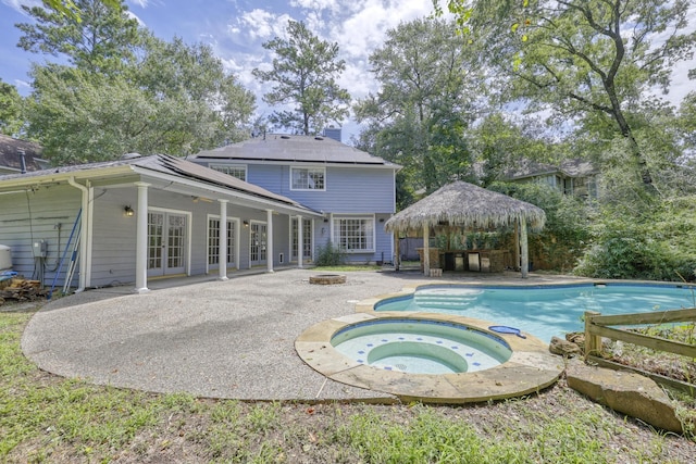 263 S Crimson Clover Ct, The Woodlands, TX 77381 - view of swimming pool with a gazebo, french doors, a patio area, and a pool with connected hot tub