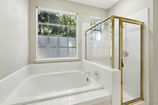 263 S Crimson Clover Ct, The Woodlands, TX 77381 - full bathroom with a shower stall and a garden tub