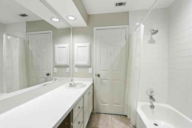 263 S Crimson Clover Ct, The Woodlands, TX 77381 - full bath featuring vanity, shower / bath combo with shower curtain, and tile patterned flooring