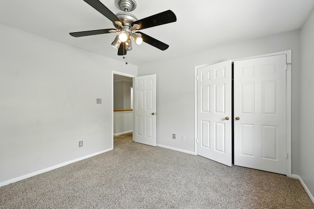 263 S Crimson Clover Ct, The Woodlands, TX 77381 - unfurnished bedroom featuring carpet, a closet, and a ceiling fan