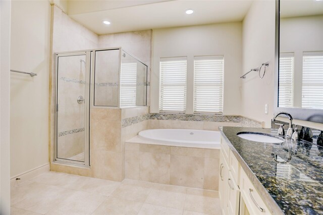 9617 Pemberton Crescent Dr, Houston, TX 77025 - full bathroom with tile patterned floors, vanity, a bath, a stall shower, and recessed lighting